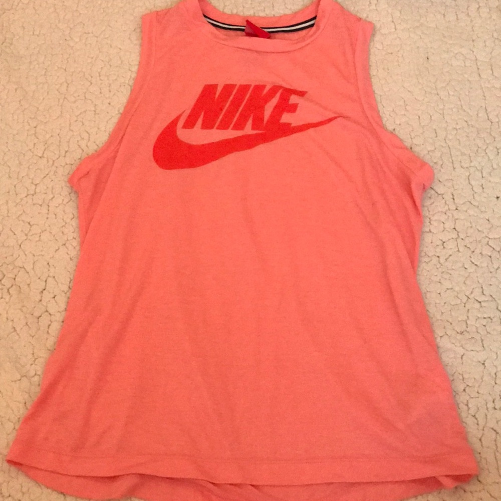 light pink and red sleeveless NIKE tee